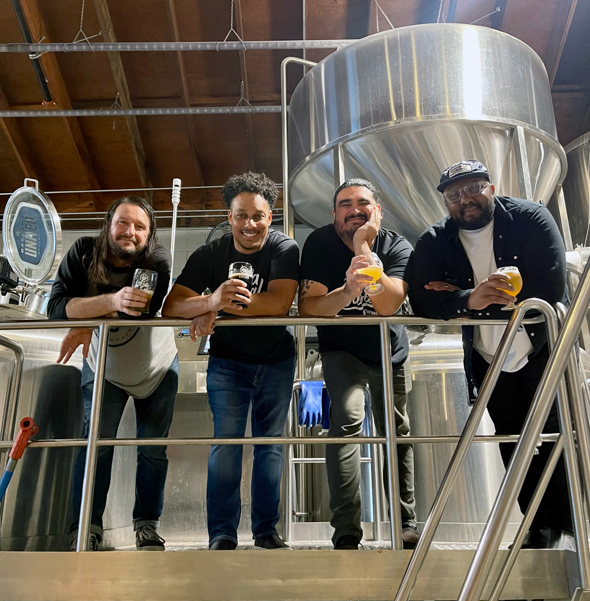 Collab with Hella Coastal brewing showing brewers at brewhouse